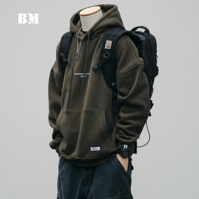 Plus Size Harajuku High Quality Thin Couple Pullover in dark green, worn by a person with a backpack.
